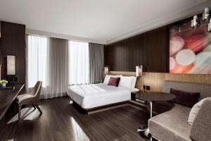 Tempat tidur dalam kamar di Toronto Marriott Markham