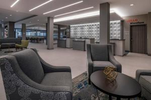 A seating area at TownePlace Suites By Marriott Wrentham Plainville