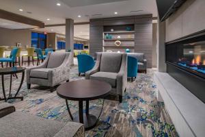 A seating area at TownePlace Suites By Marriott Wrentham Plainville