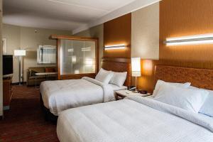 Postelja oz. postelje v sobi nastanitve SpringHill Suites by Marriott Deadwood