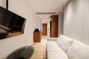 A television and/or entertainment centre at Kantoni Suites