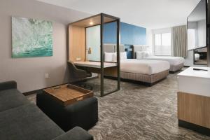 Postelja oz. postelje v sobi nastanitve SpringHill Suites Dallas DFW Airport South/CentrePort