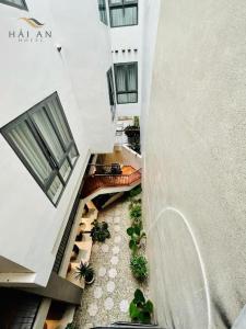 an overhead view of a building with stairs and plants at HẢI AN HOTEL in Bao Loc