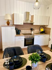 Una cocina o kitchenette en Fundis Apartment