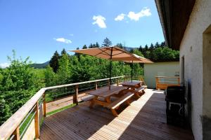 En balkong eller terrasse på Gite des Rosiers