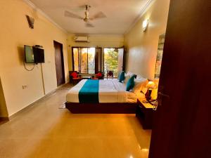 Voodi või voodid majutusasutuse Shivam Beach Resort, Goa toas