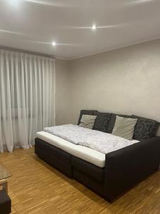 Posteľ alebo postele v izbe v ubytovaní City Home- Business Apartment, private Parking Free