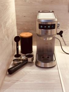 Comodidades para preparar café e chá em Apartman 15