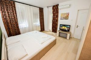 Krevet ili kreveti u jedinici u okviru objekta Budget Accommodation