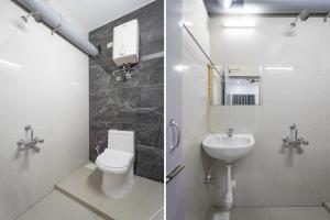 Un baño de Hotel JS Residency