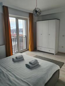 Krevet ili kreveti u jedinici u objektu Apartament Mara Centru