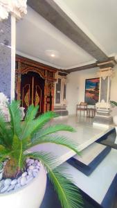 Зона вітальні в Puri Rama Guest House Denpasar Bali