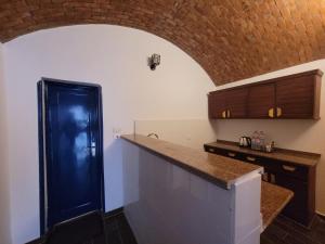 A kitchen or kitchenette at Sharqotel Luxor