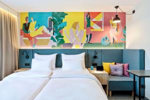 Cama ou camas em um quarto em Spark by Hilton Vienna Messe Prater