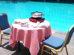 Piscina a Century Helang Hotel o a prop