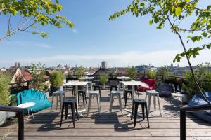 En balkon eller terrasse på Ruby Lilly Hotel Munich