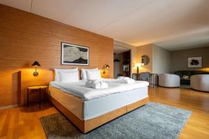 Giường trong phòng chung tại Hotel G Gothenburg