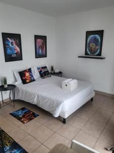 Giường trong phòng chung tại C301 Appartement Proche DisneyLand Paris