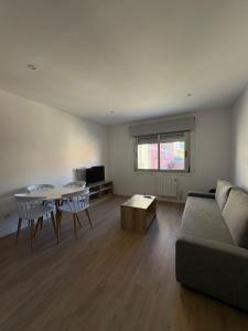 Кът за сядане в Apartamentos O Grove Awa Bay