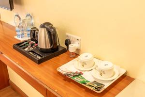 Tetera y cafetera en Hillcourt Resort and Spa