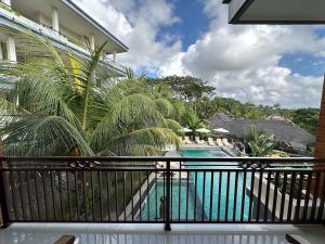 Poolen vid eller i närheten av Brata Cottage Ubud