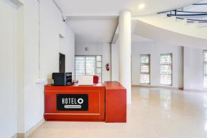 an office with a mitto counter in a room at Hotel O ECR Stays Near Nemmeli Beach formerly GVS Homes in Chennai