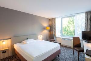 Posteľ alebo postele v izbe v ubytovaní Best Western Plus Hotel Dresden City