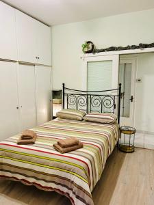 A bed or beds in a room at Super Nuova - Private Parking