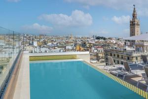 The swimming pool at or close to Querencia de Sevilla, Autograph Collection