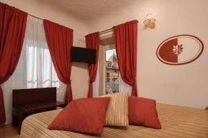 Vuode tai vuoteita majoituspaikassa Hotel Cardinal of Florence - recommended for ages 25 to 55