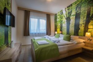 Voodi või voodid majutusasutuse Hilson Jasna - Garden resort toas