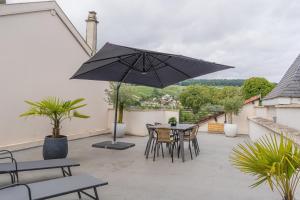 Pati o zona exterior de Terrasse 86 - Terrasse & Climatisation - 4-6 personnes - BnB Epernay