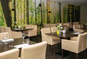 Area tempat duduk di Fletcher Hotel Restaurant De Eese