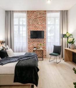 Tempat tidur dalam kamar di Hotel Jazz Market Square Wroclaw