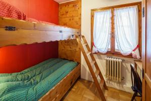 Cama ou camas em um quarto em Villa Franchetti - Stayincortina