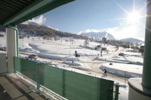 a view from a balcony of a ski slope at TH Sestriere - Villaggio Olimpico in Sestriere