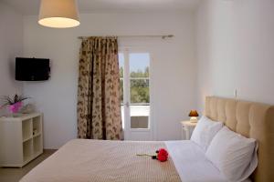 Vuode tai vuoteita majoituspaikassa Almira Suites - Seafront - Naousa Paros