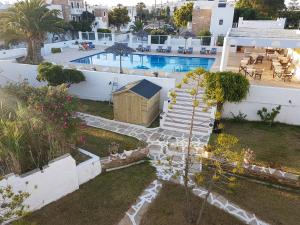 an aerial view of a house with a swimming pool at Archipelagos in Naxos Chora