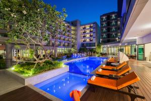 The swimming pool at or close to Hotel J Pattaya