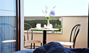 Rooms Edda tesisinde bir balkon veya teras