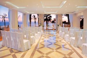 A seating area at Alexander The Great Beach Hotel