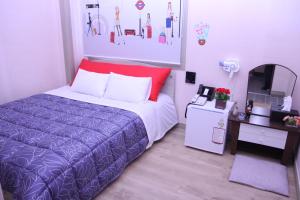 Hostel Dahyun & Guesthouse tesisinde bir odada yatak veya yataklar