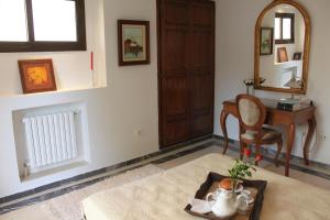 a room with a table and a chair and a desk at Villa Sidi Bou Said in Sidi Bou Saïd