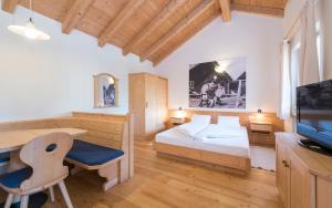 Lova arba lovos apgyvendinimo įstaigoje Apartment Lodge Gasserhof