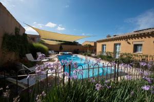 The swimming pool at or close to Aquae Sinis Albergo Diffuso