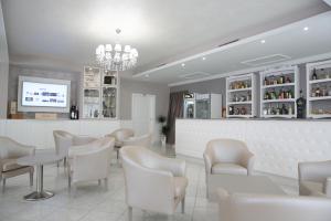 Lounge atau bar di Hotel Leon - Ristorante Al Cavallino Rosso