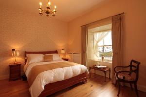 Tempat tidur dalam kamar di Corrib House Guest Accommodation