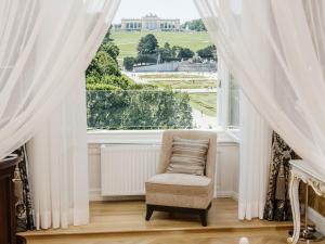 Svetainės erdvė apgyvendinimo įstaigoje Schloß Schönbrunn Grand Suite