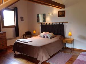 Una cama o camas en una habitación de B&B La Borella Casa Conti