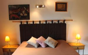 Una cama o camas en una habitación de B&B La Borella Casa Conti